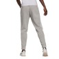 Pantaloni Adidas Essentials Colorblock Block Cut 3-Stripes Regular Tapered W HB2768