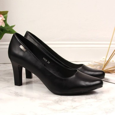 Black pumps on the W Sergio Leone post